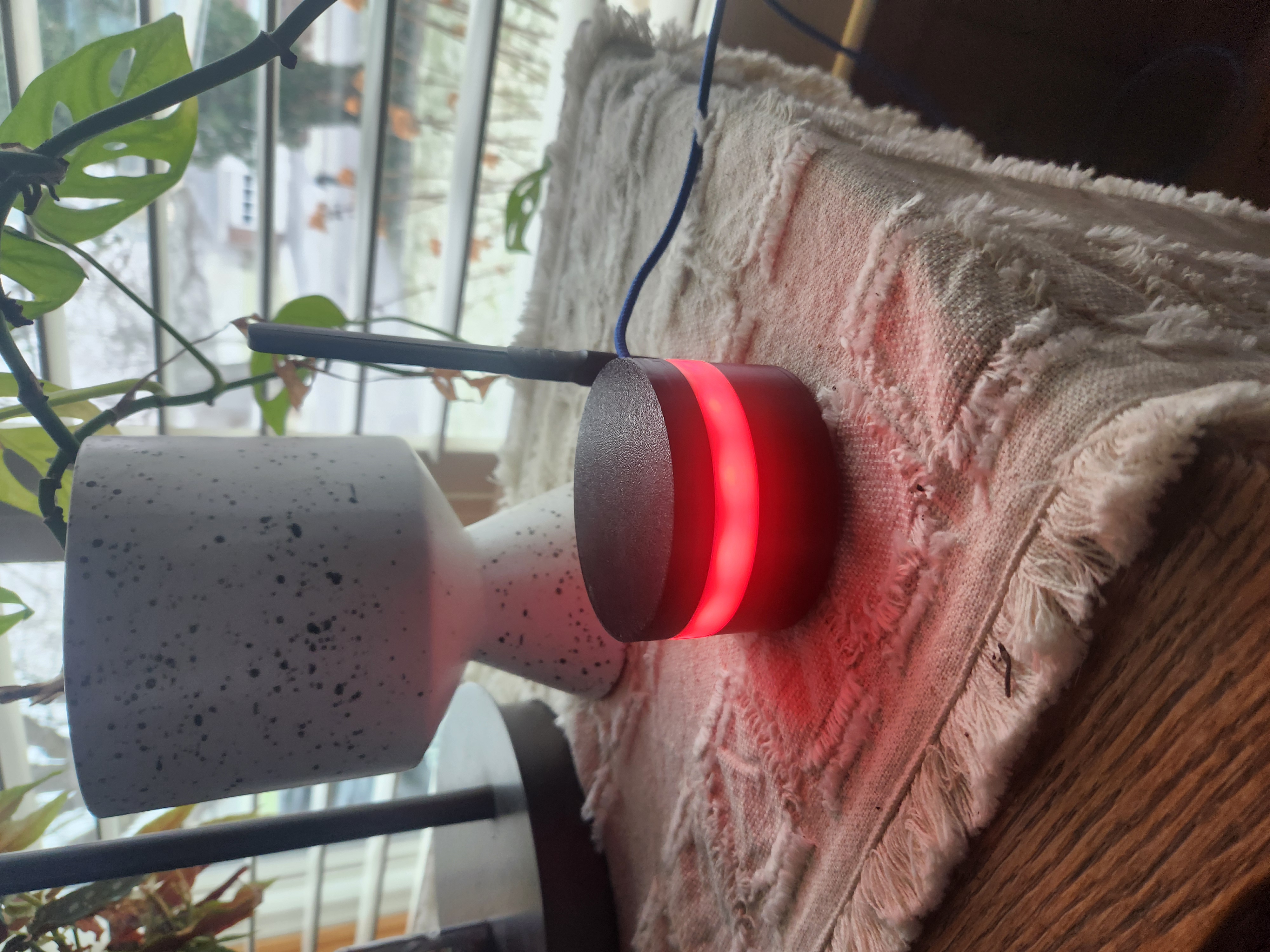 Device with red lights flashing